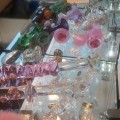 Crystal Delights display case - glass dildos, glass plugs, a bunny tail and more