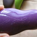 Top side of the We-Vibe Touch which is the same shiny silicone as the original We-Vibe couple's vibrator. So yes, it attracts dust & fur like a magnet. 