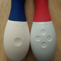 Lelo Mona Wave (in blue) handle and buttons vs. Lelo Mona 2. The Mona 2's buttons are clearly individual buttons, whereas the Mona Wave is markings on the silicone skin with only a fingertip-sized dimple in the center
