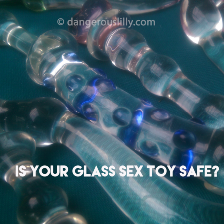 Is your glass sex toy safe? Image shows an array of glass sex toys on a teal background